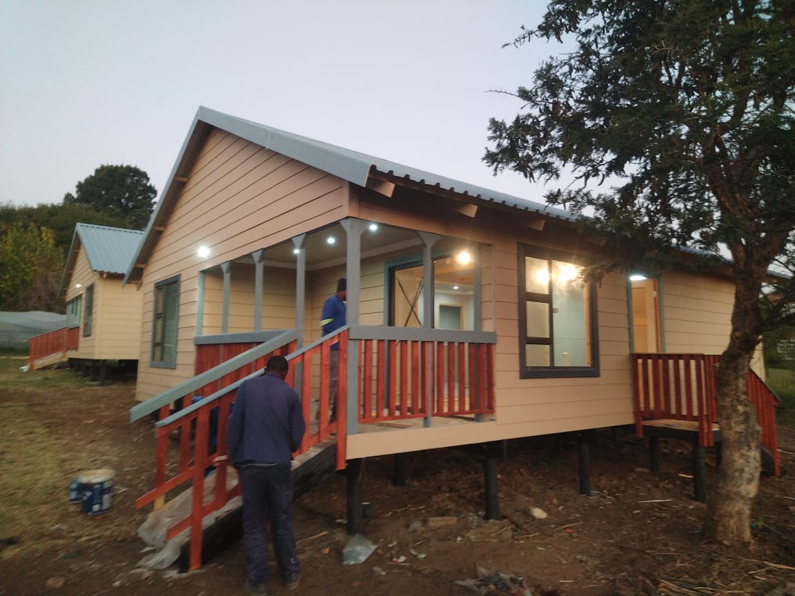 Twin Nutec homes at dusk